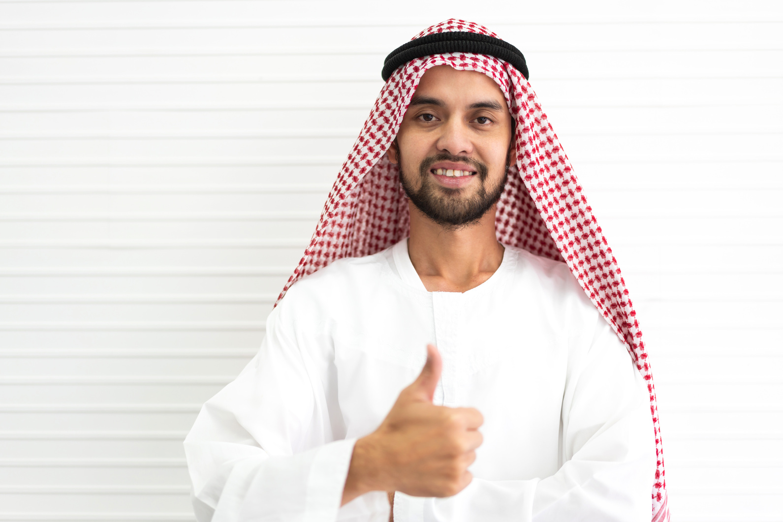 Portrait of happy smiling handsome middle eastern arab man i